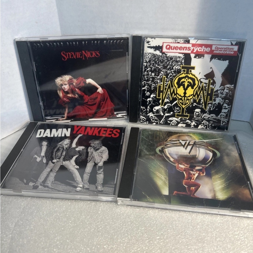 CD Collection Featuring Stevie Nicks, Queensrÿche, Damn Yankees, and Van Halen